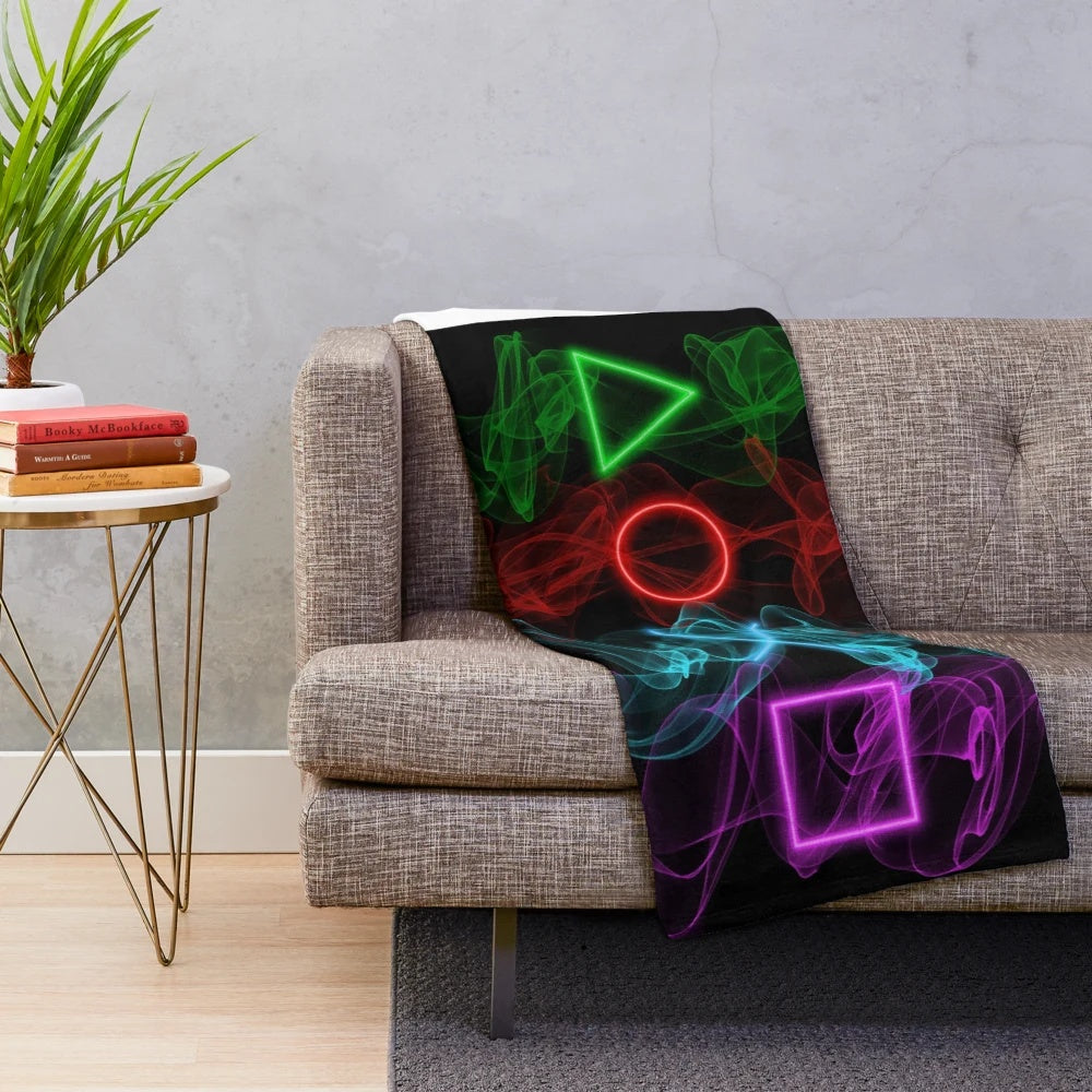 Plush blanket with controller buttons design