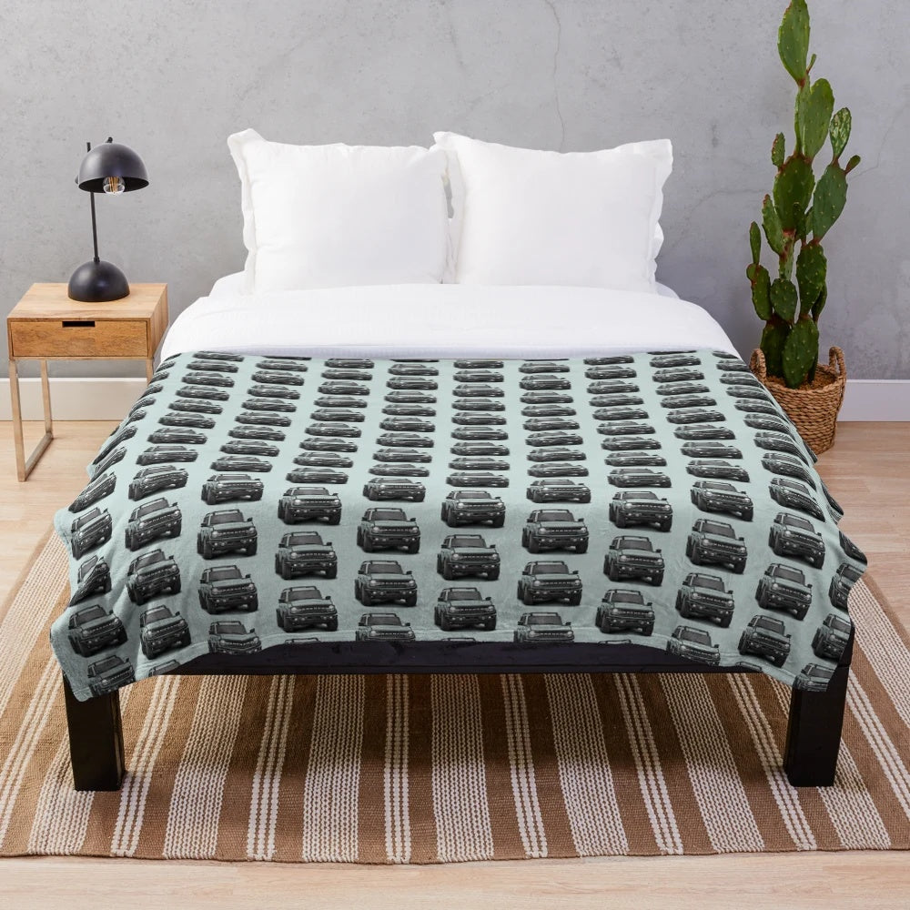 Cactus gray plush blanket featuring the Ford Bronco logo