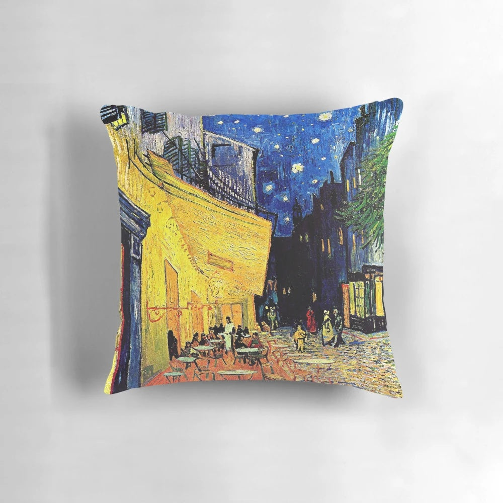 Cafe Terrace at Night Pillow featuring the iconic painting by Vincent Van Gogh, showcasing a vibrant night cafe scene.