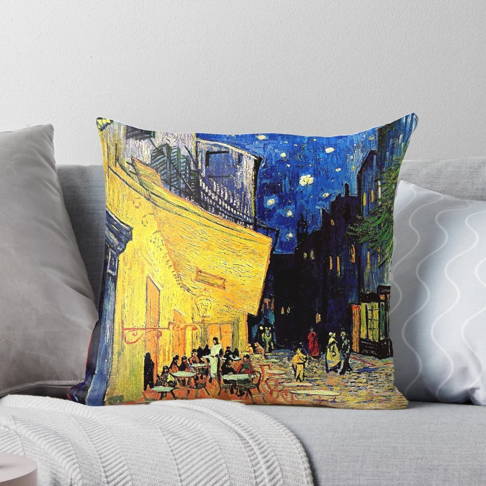 Cafe Terrace at Night Pillow featuring the iconic painting by Vincent Van Gogh, showcasing a vibrant night cafe scene.
