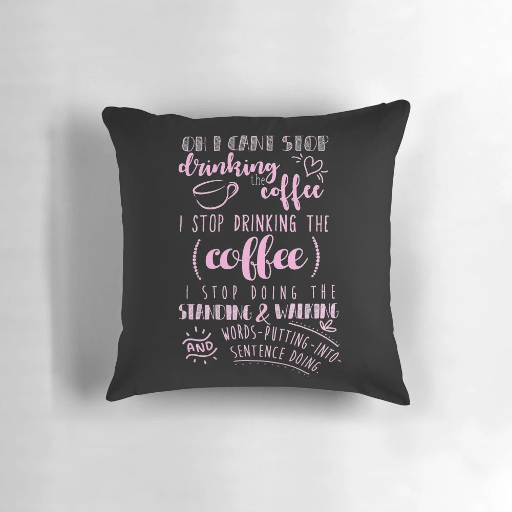 A pink pillow featuring a coffee-themed design, perfect for coffee lovers.