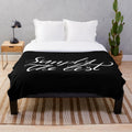 Plush blanket with calligraphy text design