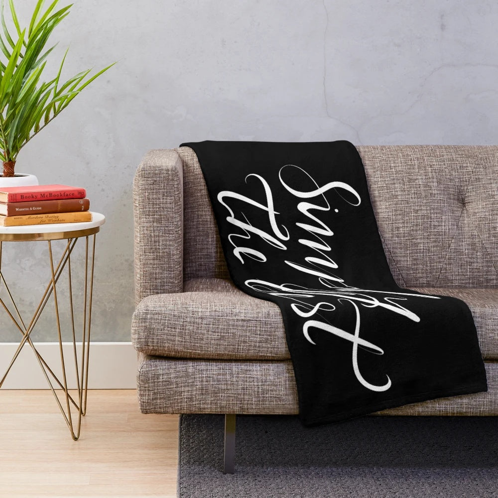 Plush blanket with calligraphy text design