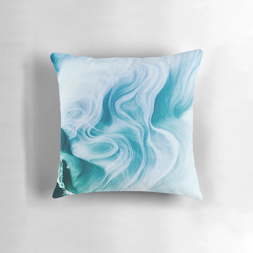 Marble sandstone pillow with abstract ocean-inspired swirling pattern