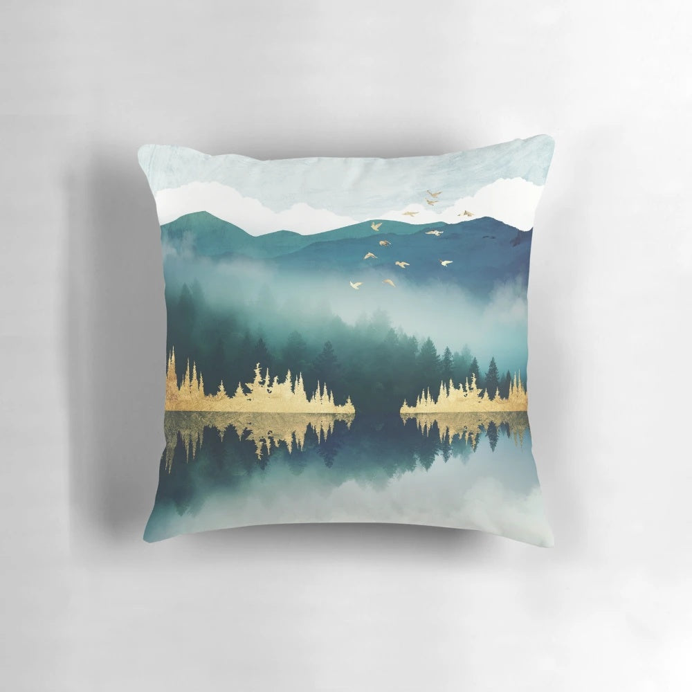 Mist reflection pillow with a serene landscape design featuring a lake, trees, and mountains.