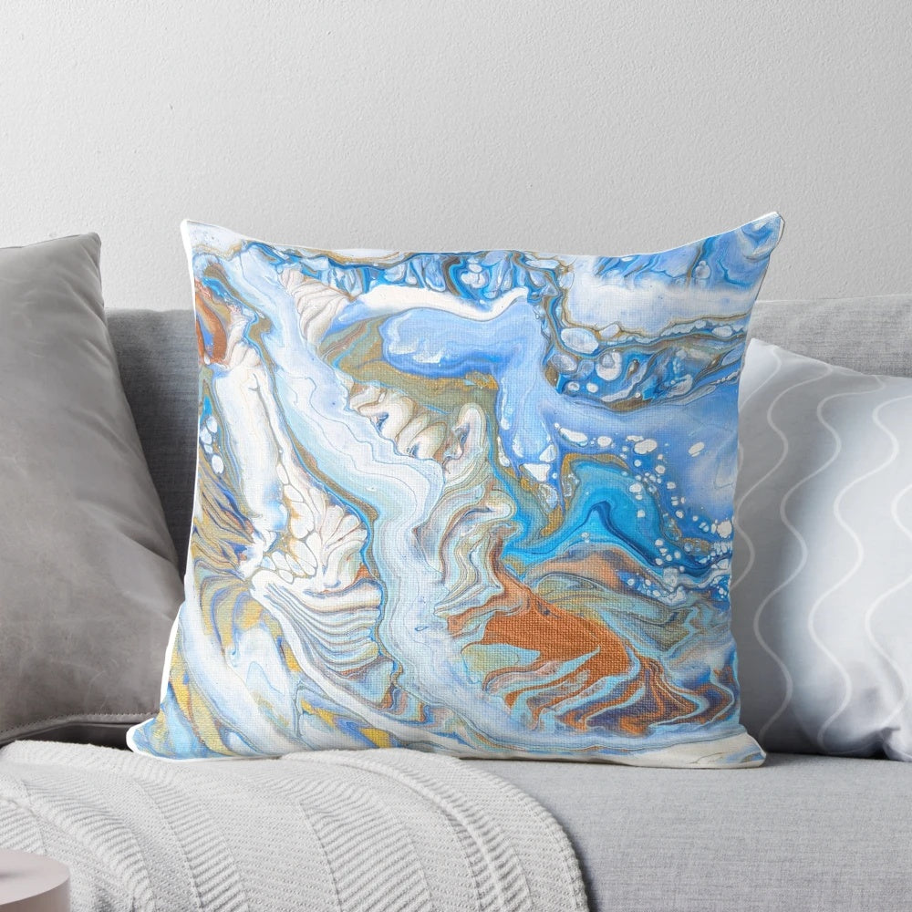 A calming sea-inspired pillow featuring a beautiful abstract acrylic pour painting design