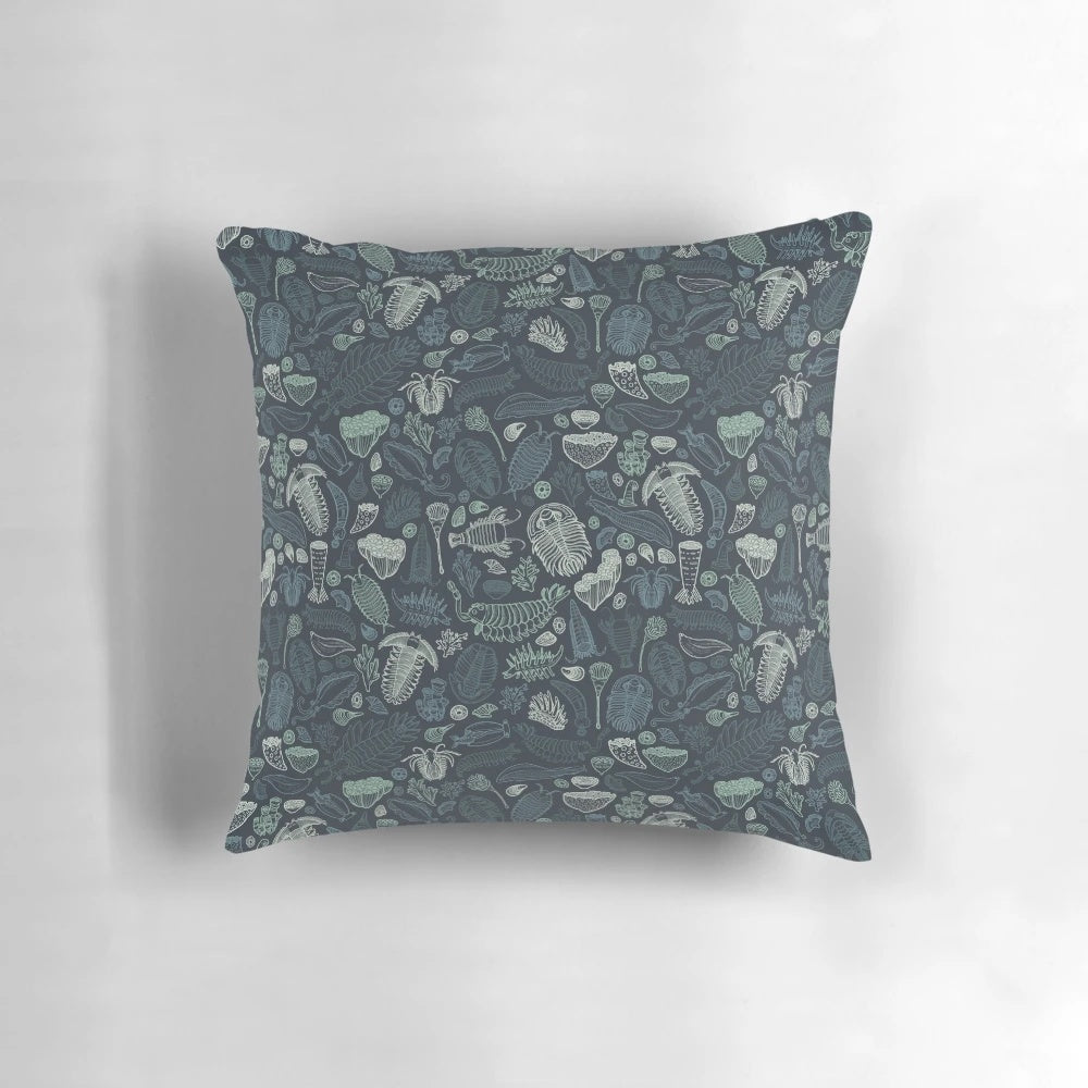Pillow featuring illustrations of Cambrian Fauna fossils like Opabinia, Anomalocaris, and Trilobites.