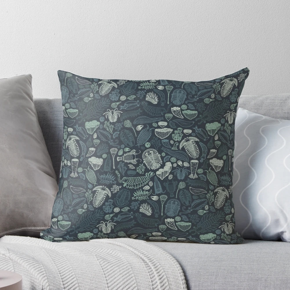 Pillow featuring illustrations of Cambrian Fauna fossils like Opabinia, Anomalocaris, and Trilobites.