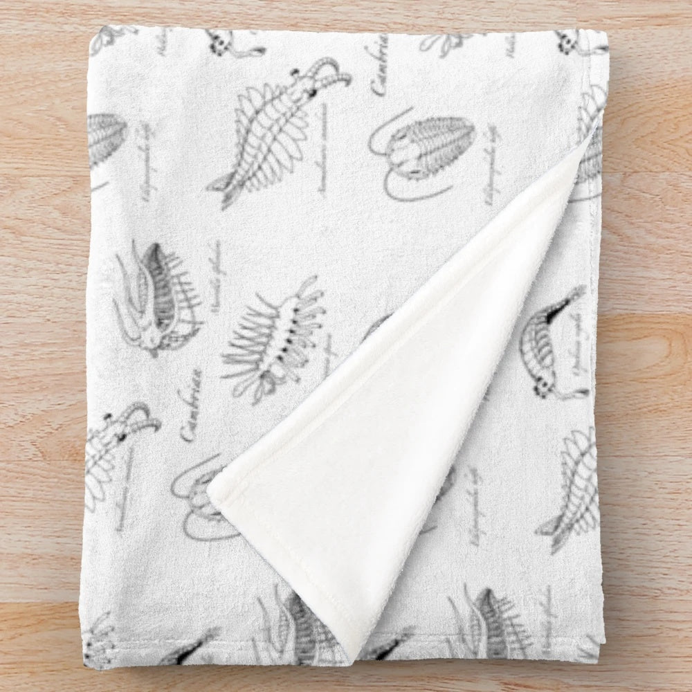 Cambrian Life inspired plush blanket featuring prehistoric creatures like Anomalocaris and Trilobite