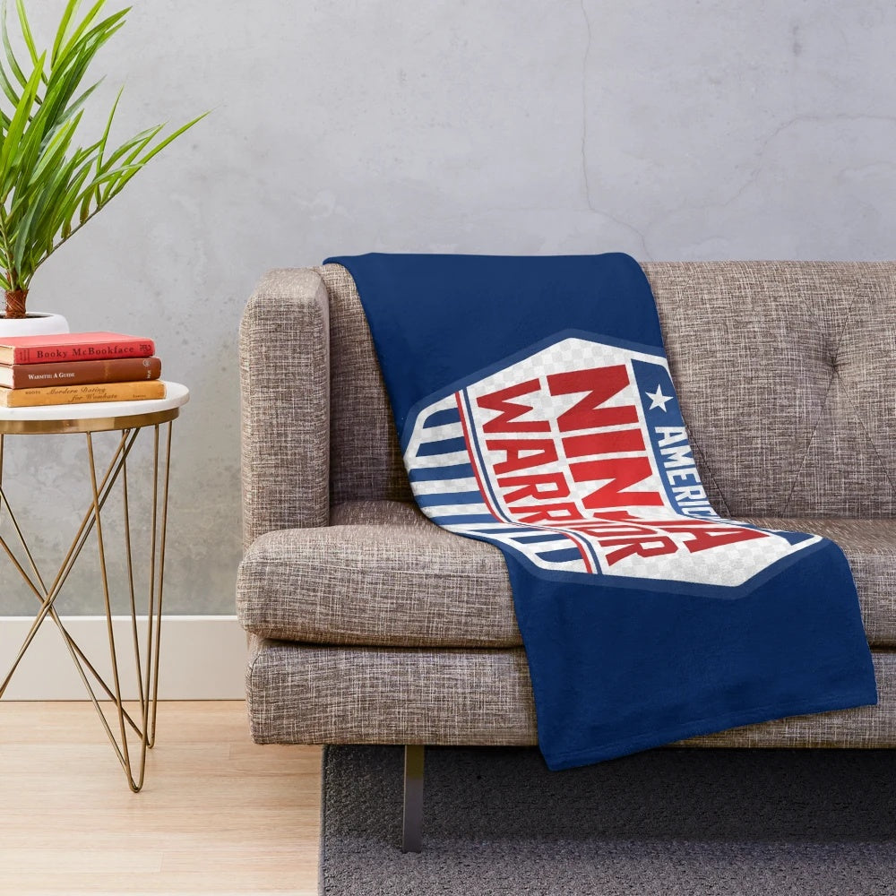 Camo plush blanket featuring American Ninja Warrior inspired design