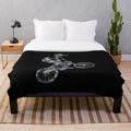 Camouflage patterned plush blanket for BMX enthusiasts