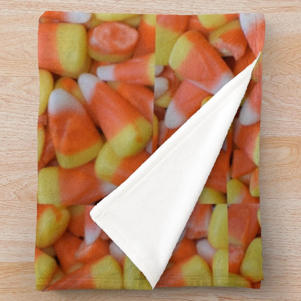 Candy corn-patterned plush blanket