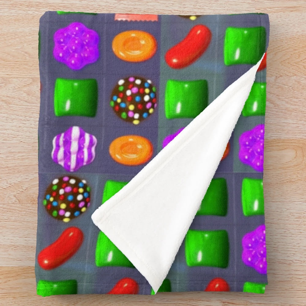 Candy Crush themed plush blanket with colorful candies and game graphics