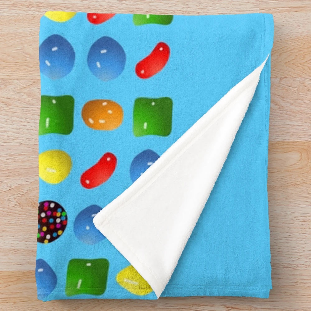 Candy Crush themed plush blanket with soft, cozy material