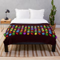 Candy-themed plush blanket with soft and cozy design
