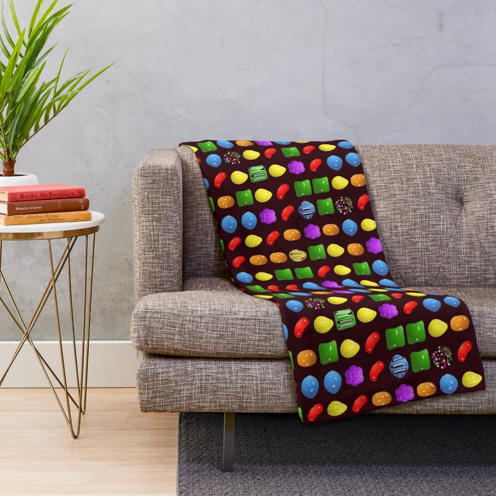 Candy-themed plush blanket with soft and cozy design