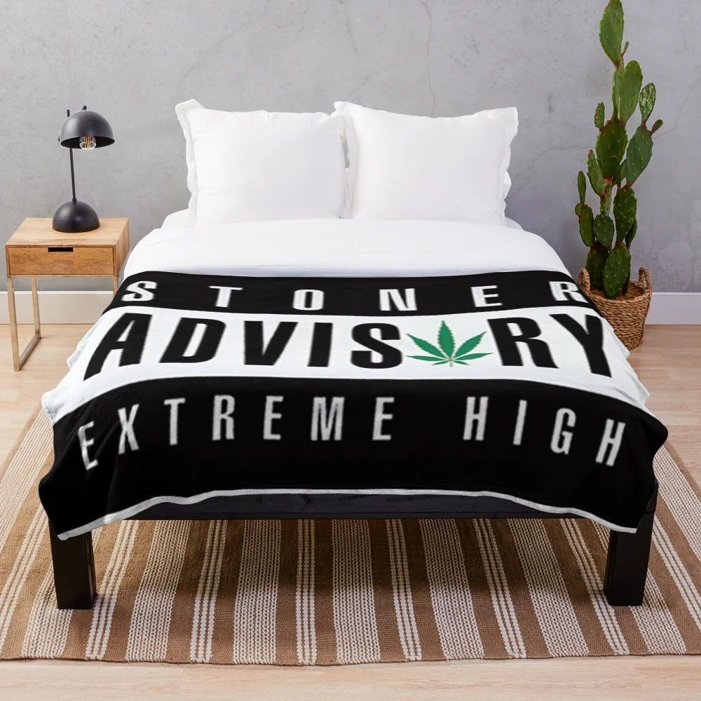Cannabis-themed plush blanket with marijuana leaf and reggae-inspired design