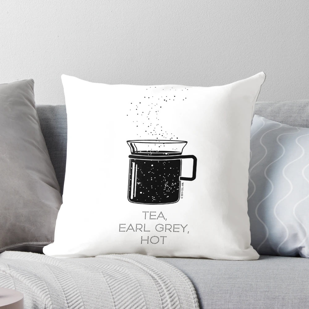 Minimalist pillow design featuring the iconic "Tea, Earl Grey, Hot" quote from Captain Picard of Star Trek: The Next Generation, set against a starfield background.