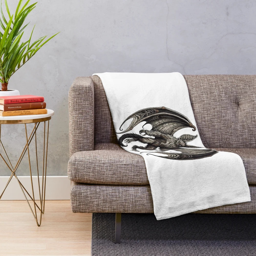 Embroidered plush blanket featuring the mythological Ahool creature