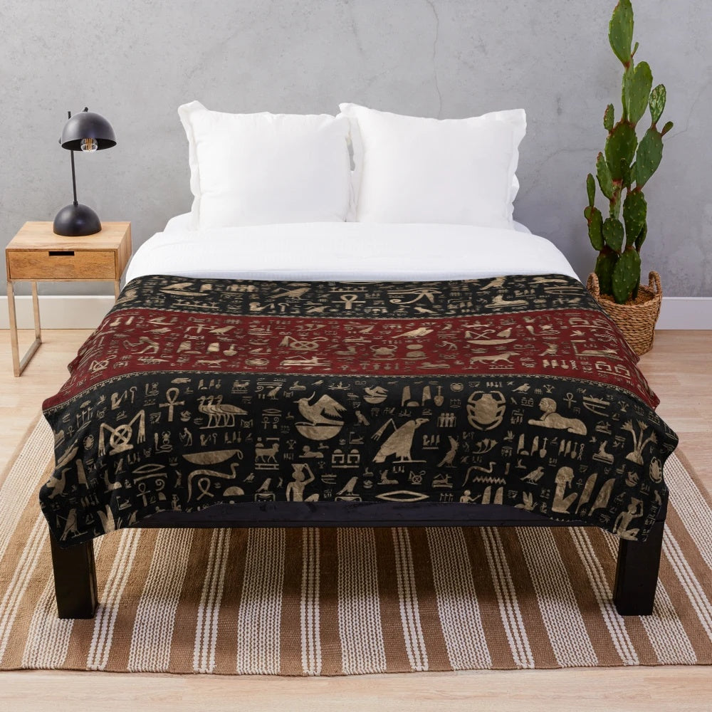 Ancient Egyptian hieroglyphic plush blanket in black, red, and gold