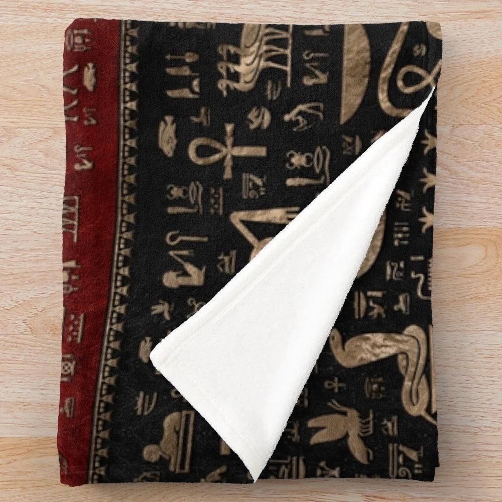 Ancient Egyptian hieroglyphic plush blanket in black, red, and gold