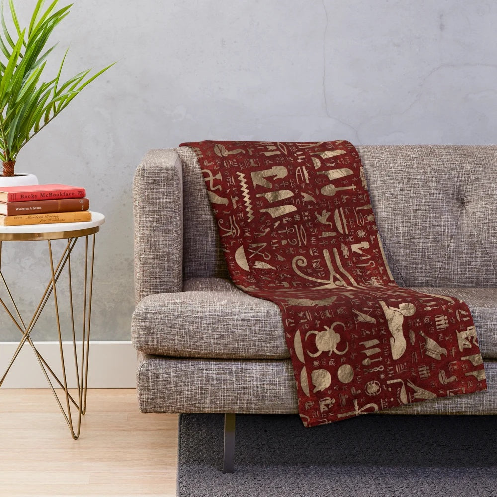 Plush blanket featuring ancient Egyptian hieroglyphic designs