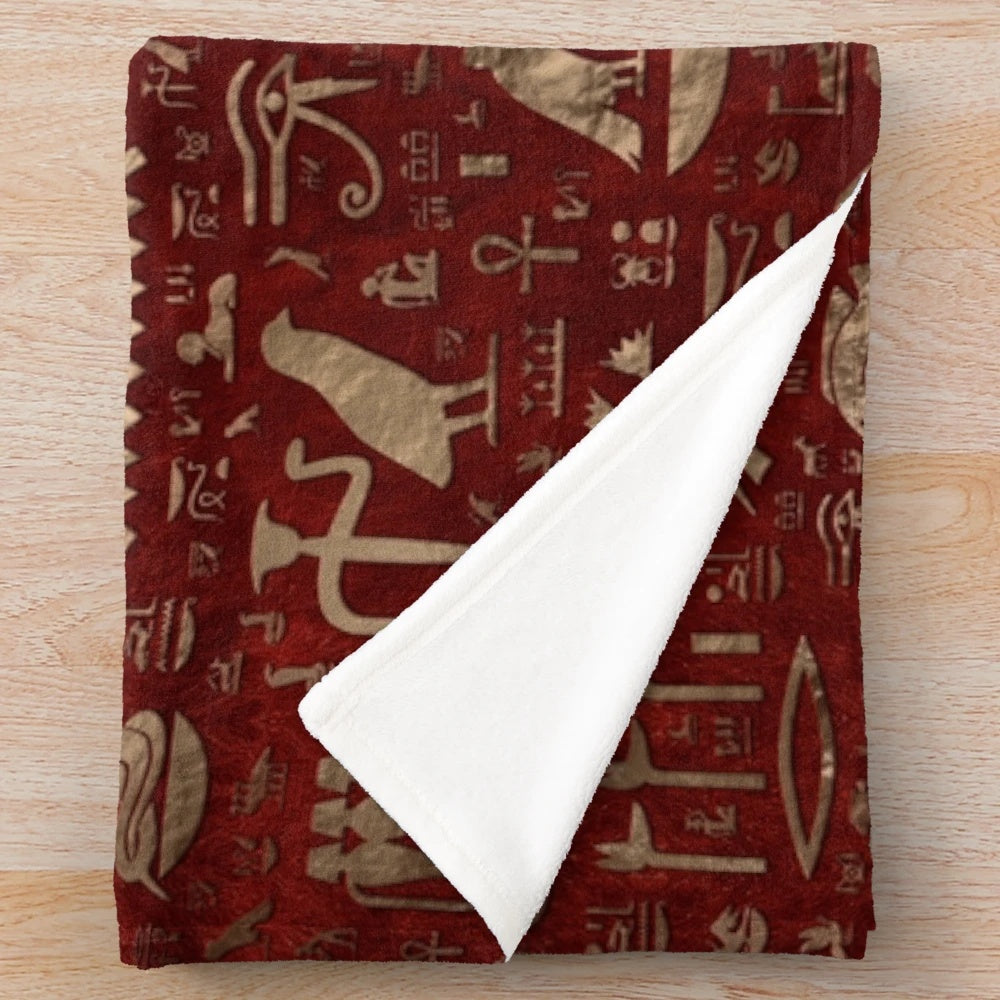 Plush blanket featuring ancient Egyptian hieroglyphic designs