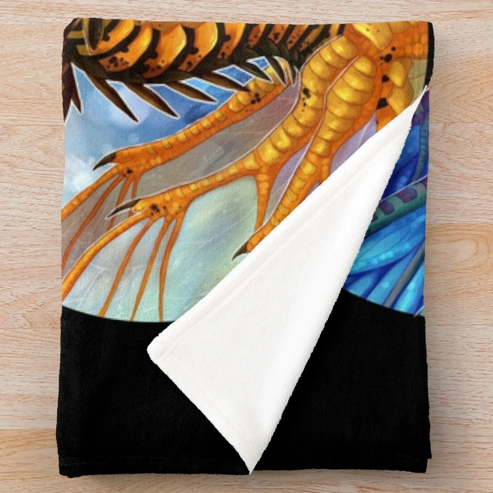 A plush blue dragon themed blanket for Wings of Fire fans