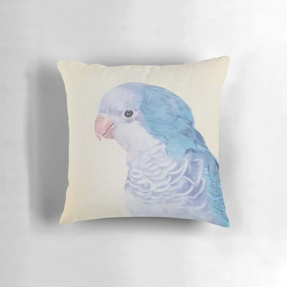 Soft, pastel-toned painting of a friendly, curious blue quaker parrot on a pillow