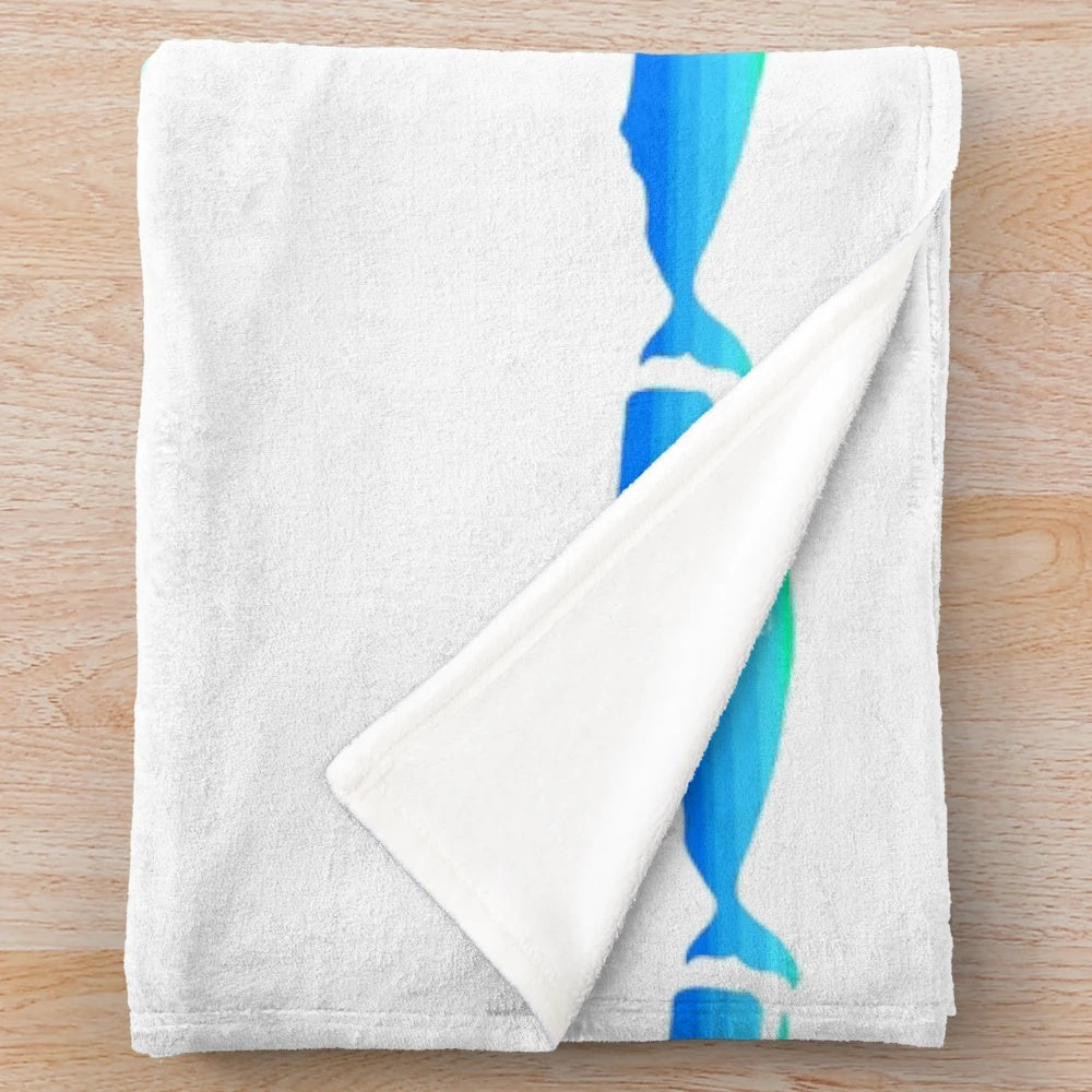 Soft and cozy plush blanket featuring a beautiful blue whale design