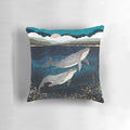 Pillow featuring a contemporary, abstract design of a whale pod in the ocean.