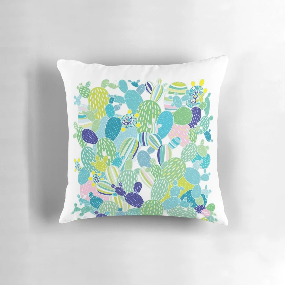Vibrant cactus and succulent themed pillow with hand-drawn botanical design