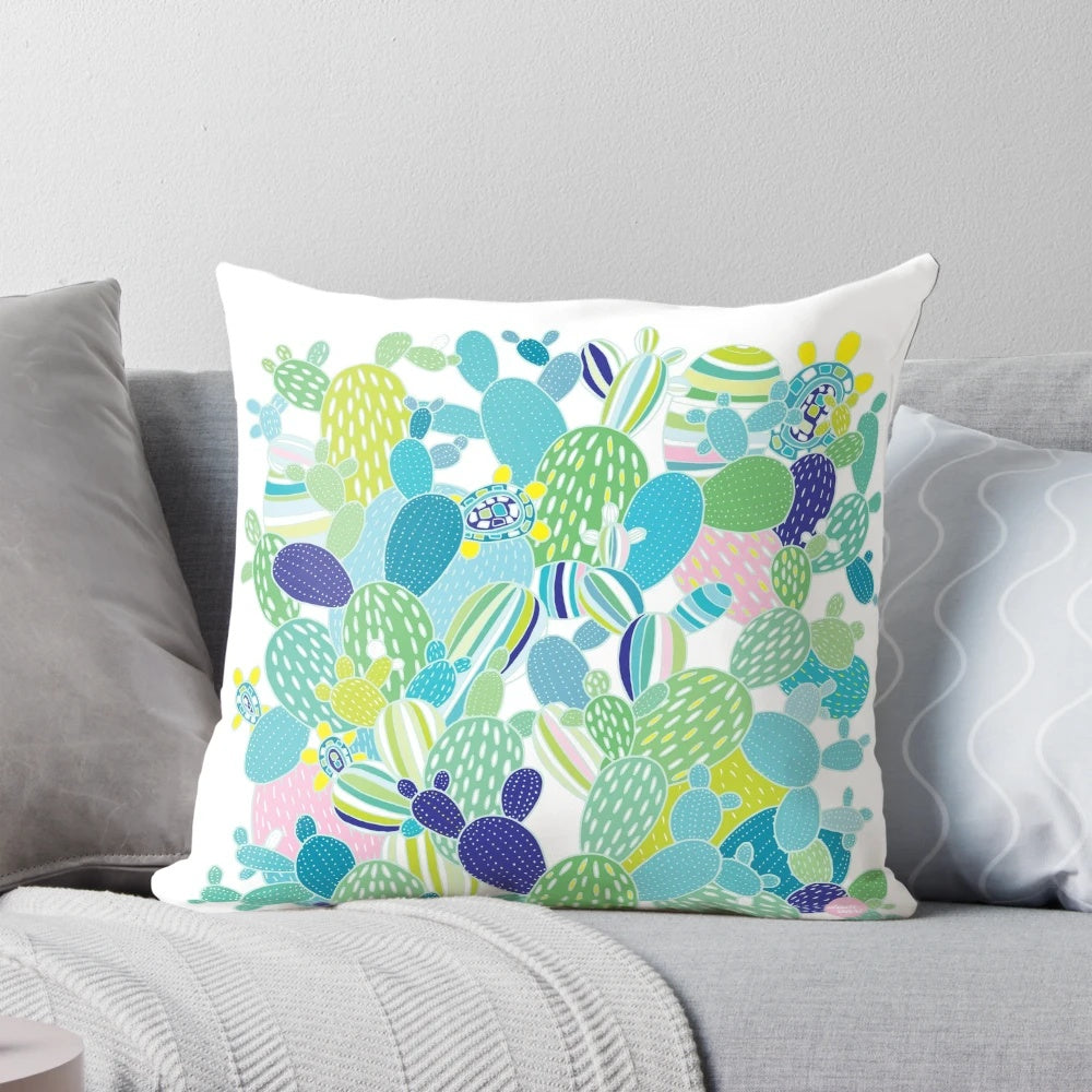 Vibrant cactus and succulent themed pillow with hand-drawn botanical design