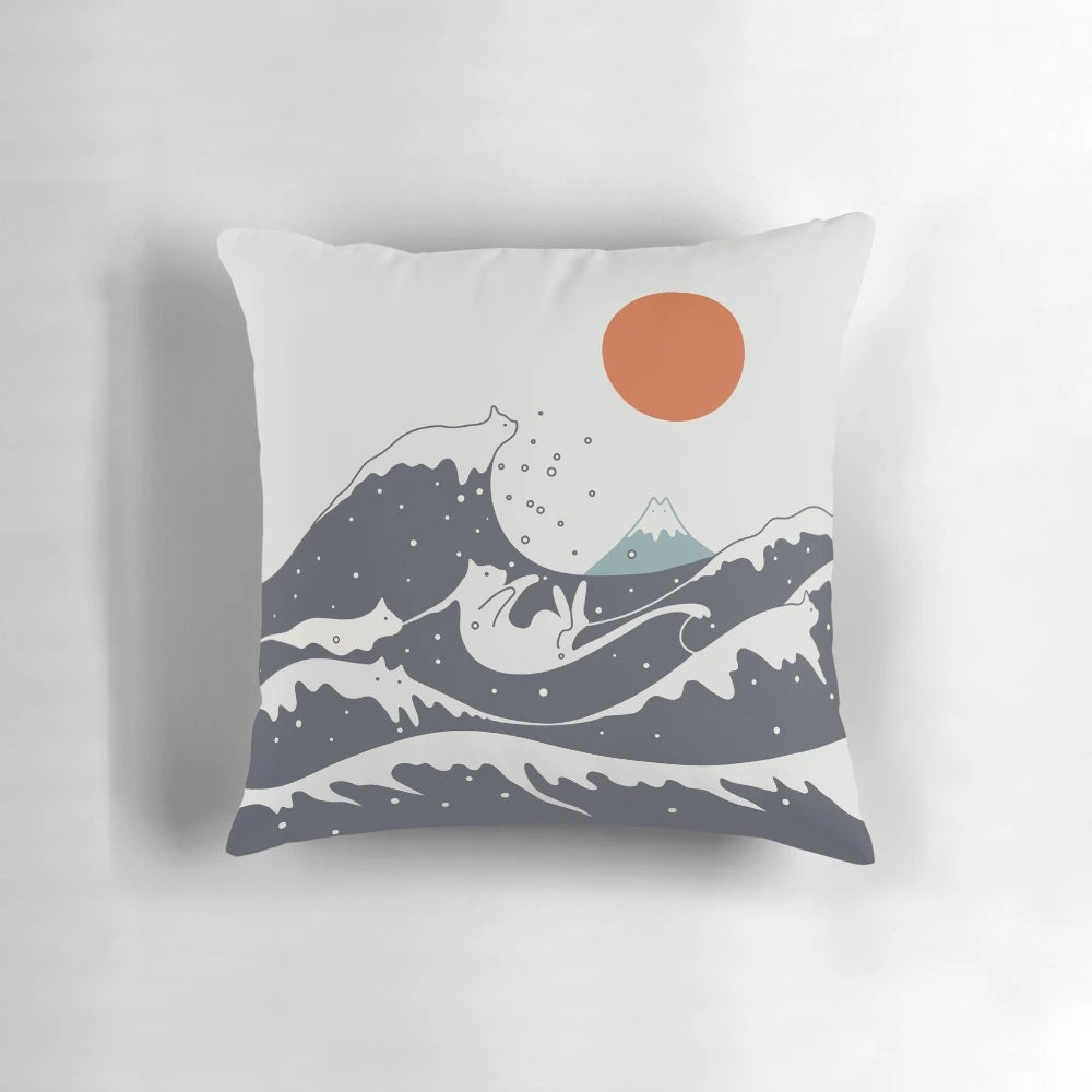 A beautiful pillow featuring a stunning cat landscape design with ocean waves and a dramatic sunset.