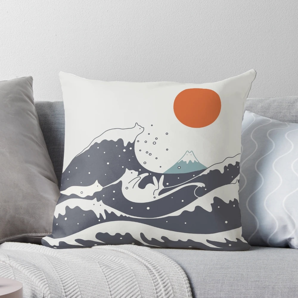 A beautiful pillow featuring a stunning cat landscape design with ocean waves and a dramatic sunset.