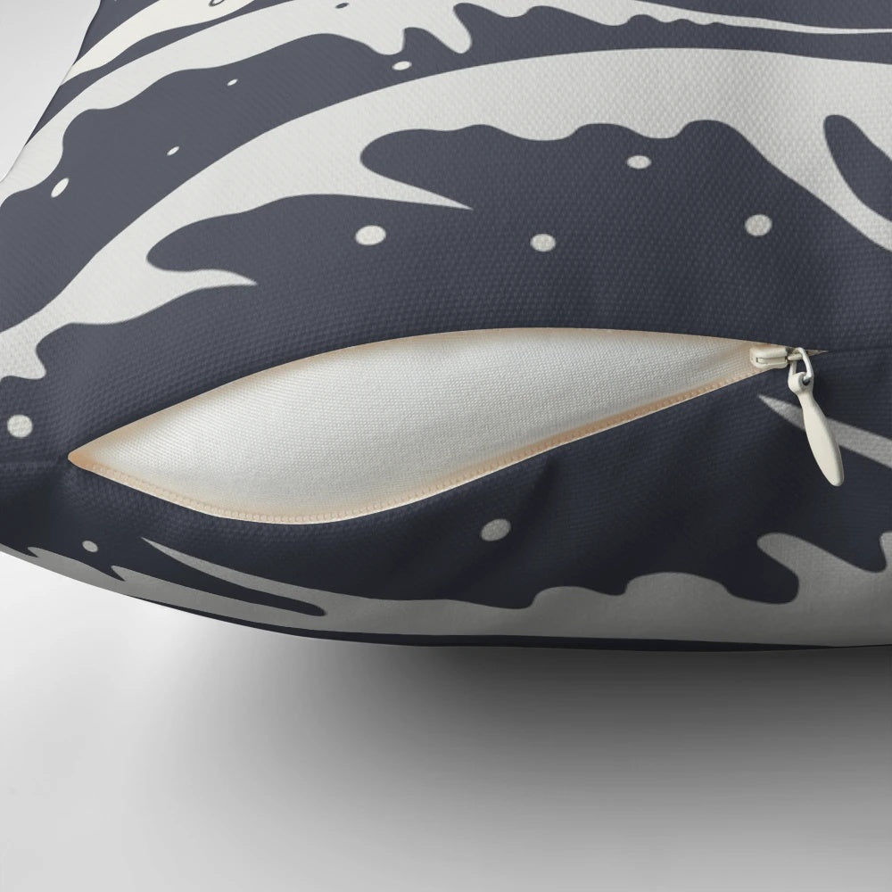 A beautiful pillow featuring a stunning cat landscape design with ocean waves and a dramatic sunset.