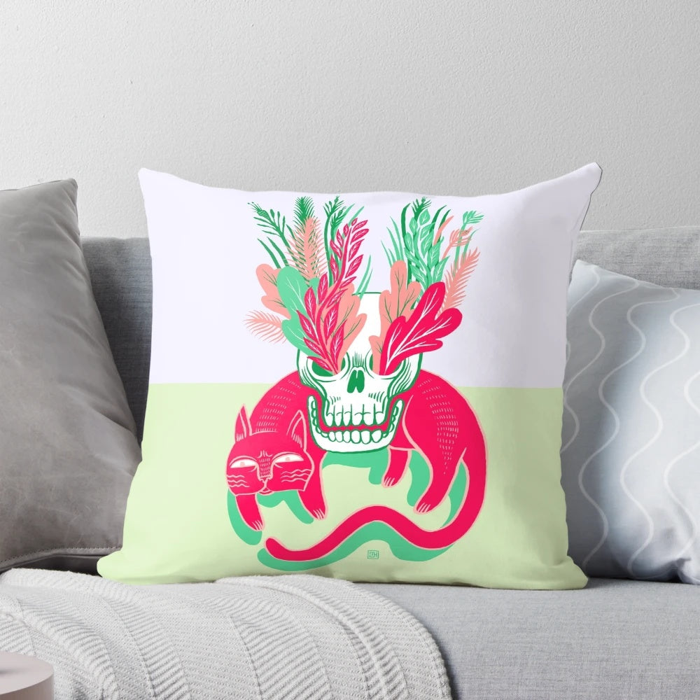 A decorative pillow featuring a detailed cat skull design surrounded by lush floral elements, perfect for adding a touch of natural elegance to your garden.
