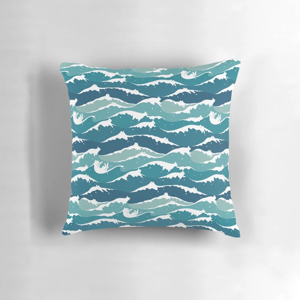 Vibrant cat waves pillow with a serene ocean landscape design