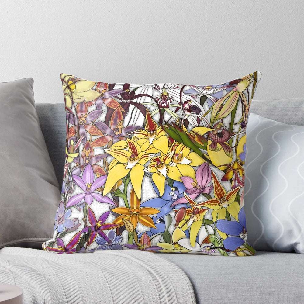 Decorative throw pillow featuring a collage of vibrant Western Australian native orchids, including the Queen of Sheba, Donkey, and Blue China varieties.