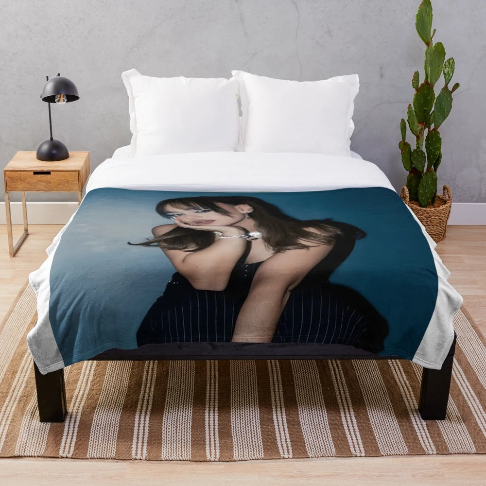 Plush blanket featuring concert history and musical instruments