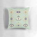 Decorative throw pillow with a vibrant evil eye design in shades of blue, gold, and mint.