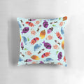 Decorative pillow featuring a whimsical fish-shaped floral design in underwater tones.
