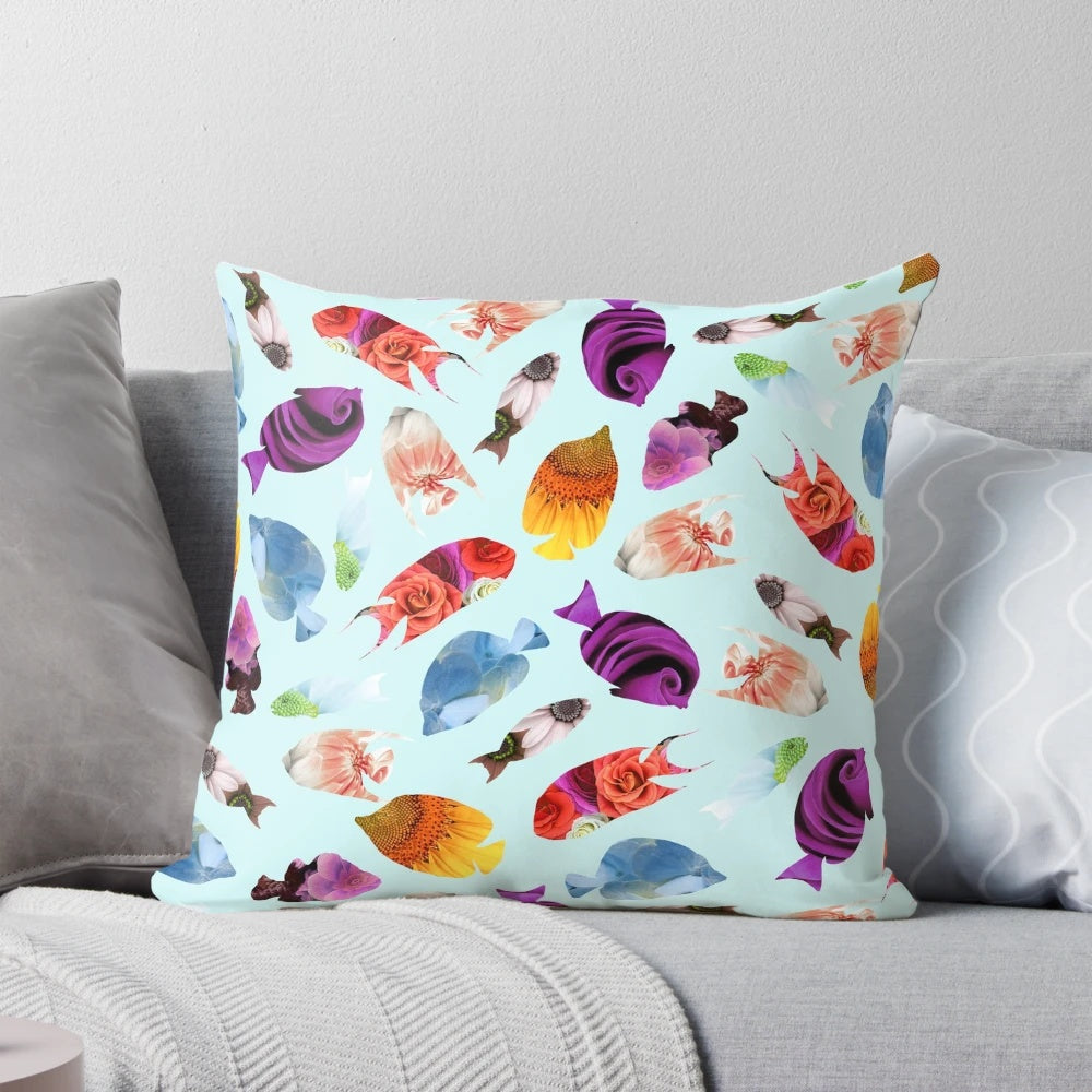 Decorative pillow featuring a whimsical fish-shaped floral design in underwater tones.