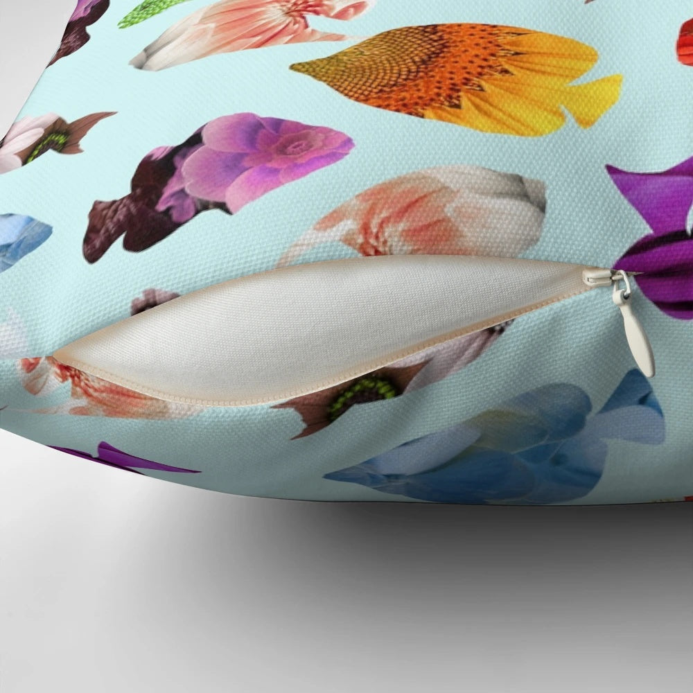 Decorative pillow featuring a whimsical fish-shaped floral design in underwater tones.