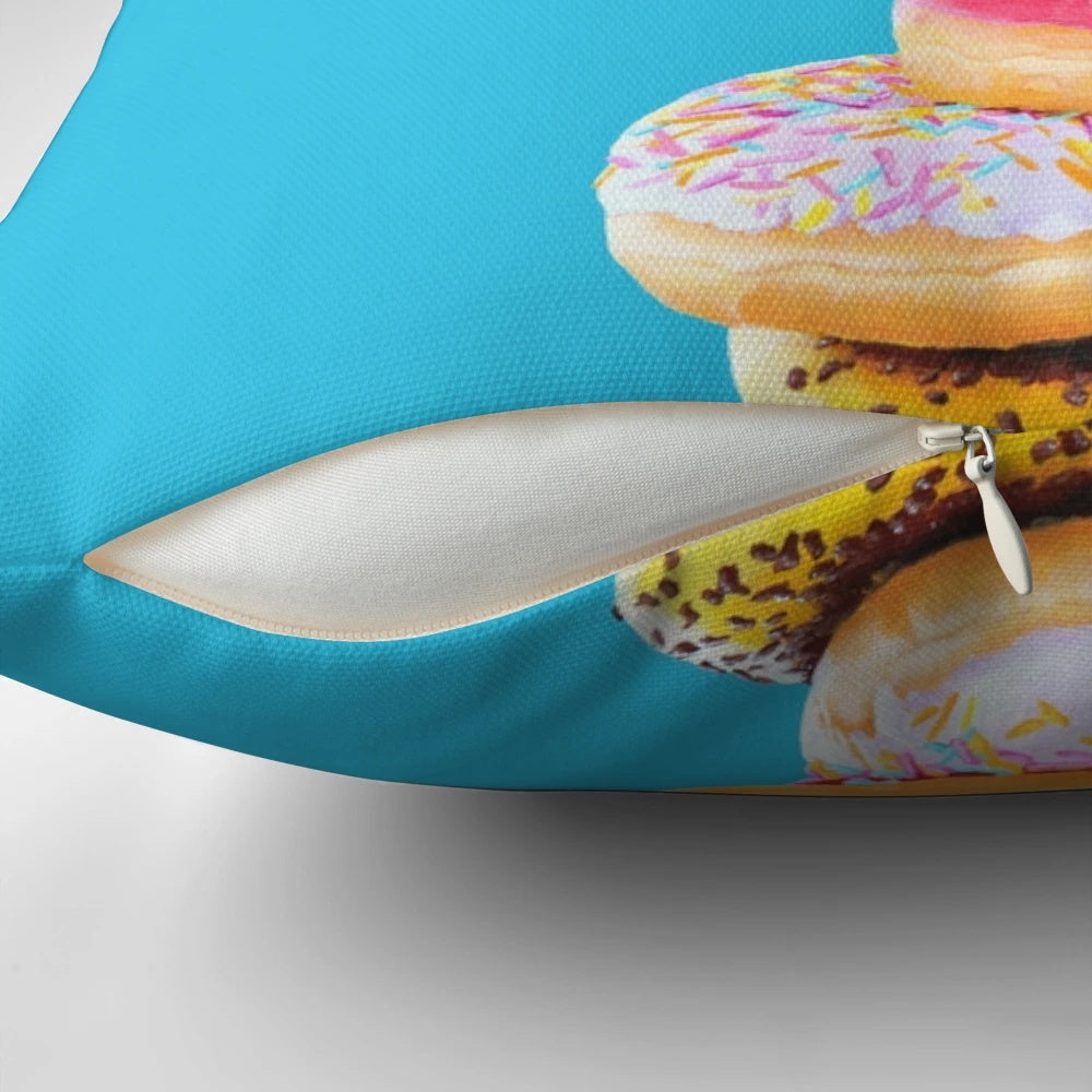 A vibrant pink flamingo perched atop a delectable doughnut-shaped pillow, creating a surreal and whimsical home accent.