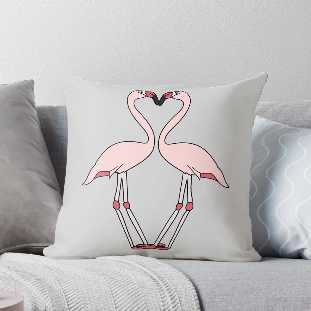 Vibrant flamingo design on a grey pillow for a stylish, nature-inspired home accent.