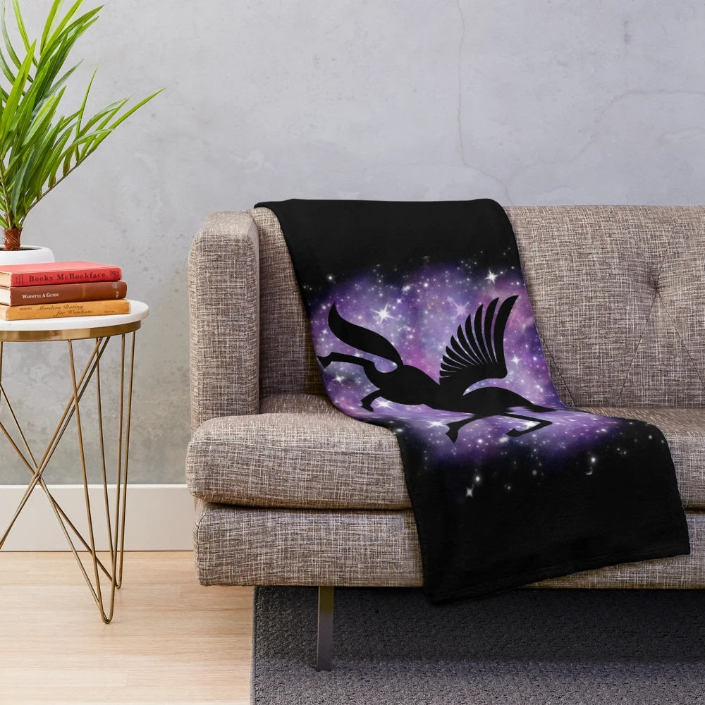 Galaxy-themed plush blanket with a sparkling unicorn design