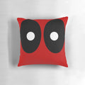 Pillow featuring a modern abstract design with black ellipses and white circles on a red background