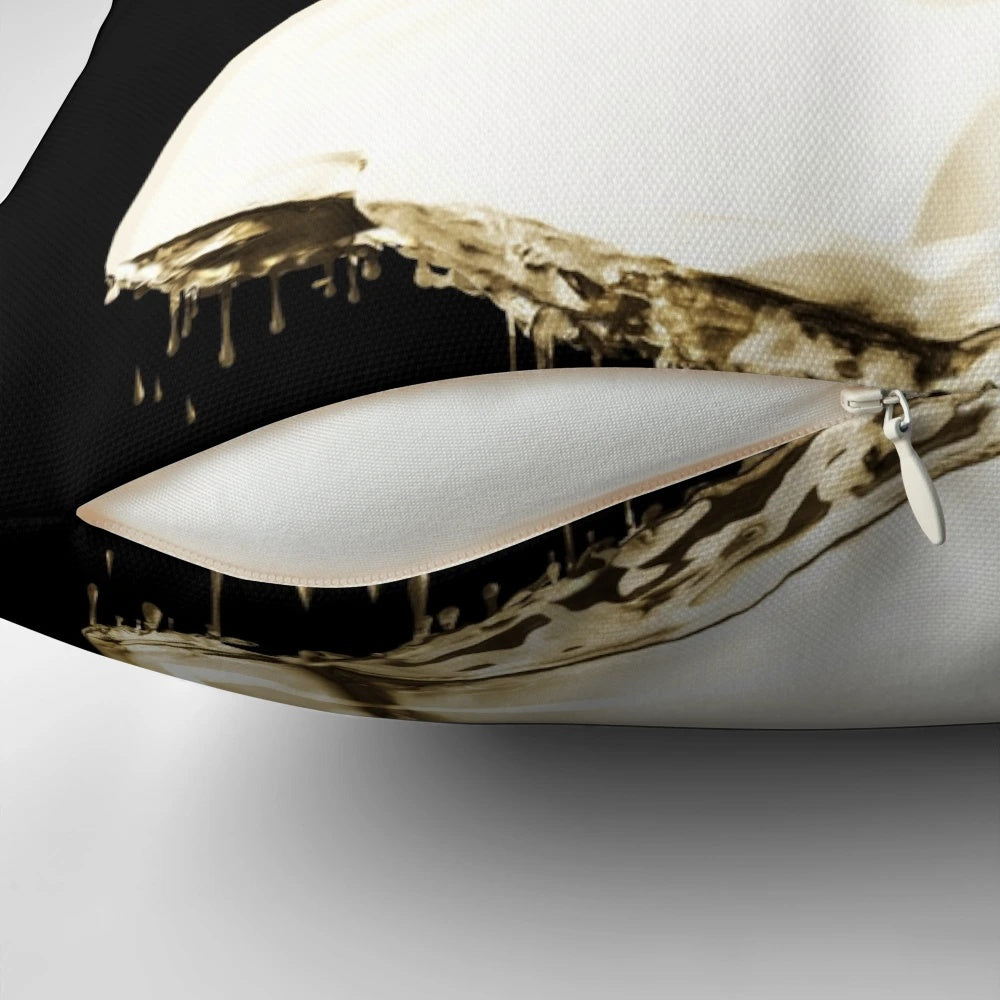 Elegant gold Medusa pillow with a melting, shimmering effect inspired by Greek mythology