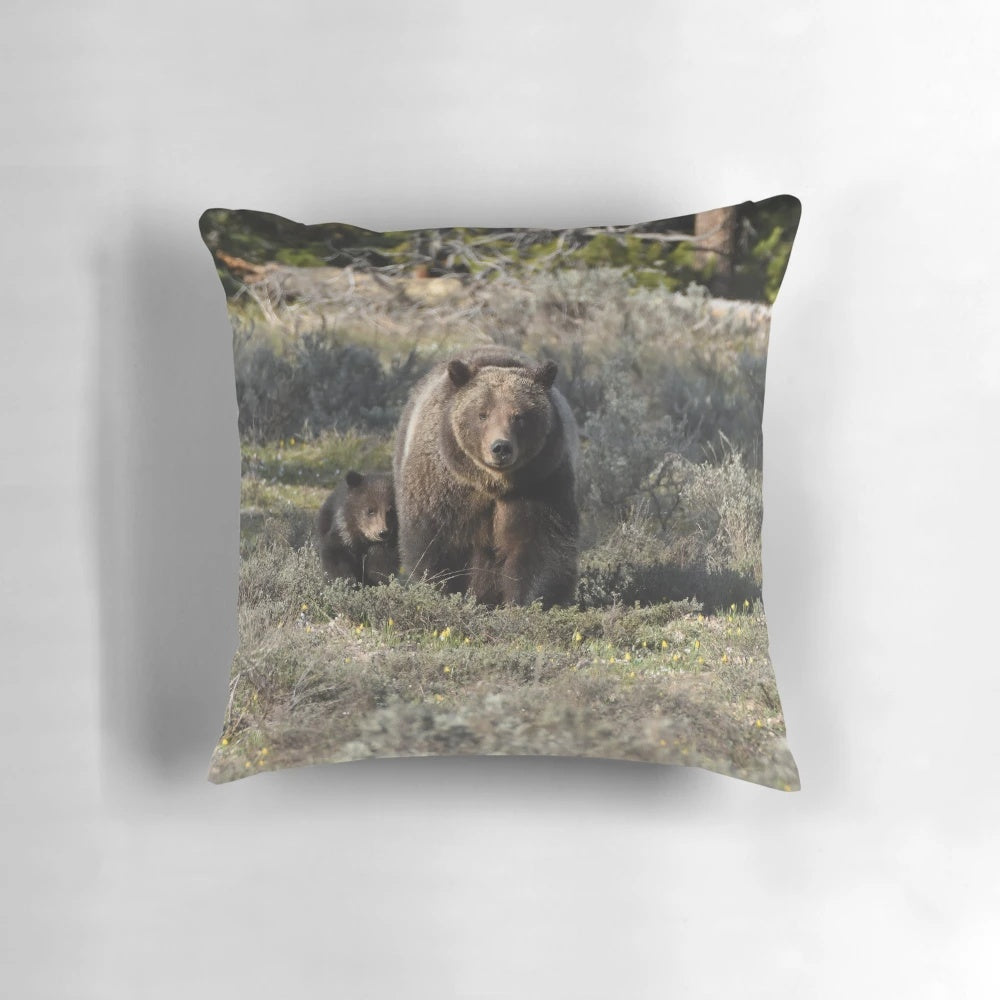 Plush, high-quality pillow featuring a stunning image of a grizzly bear cub in a natural setting.
